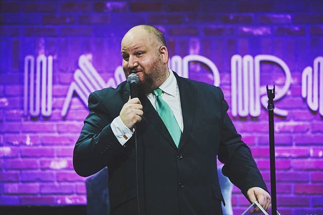 Stephen Kramer Glickman onstage at Hollywood Improv.